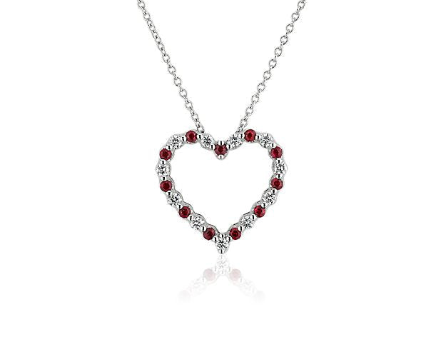 Floating Ruby And Diamond Heart Shaped Pendant