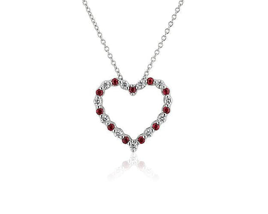 Floating Ruby And Diamond Heart Shaped Pendant